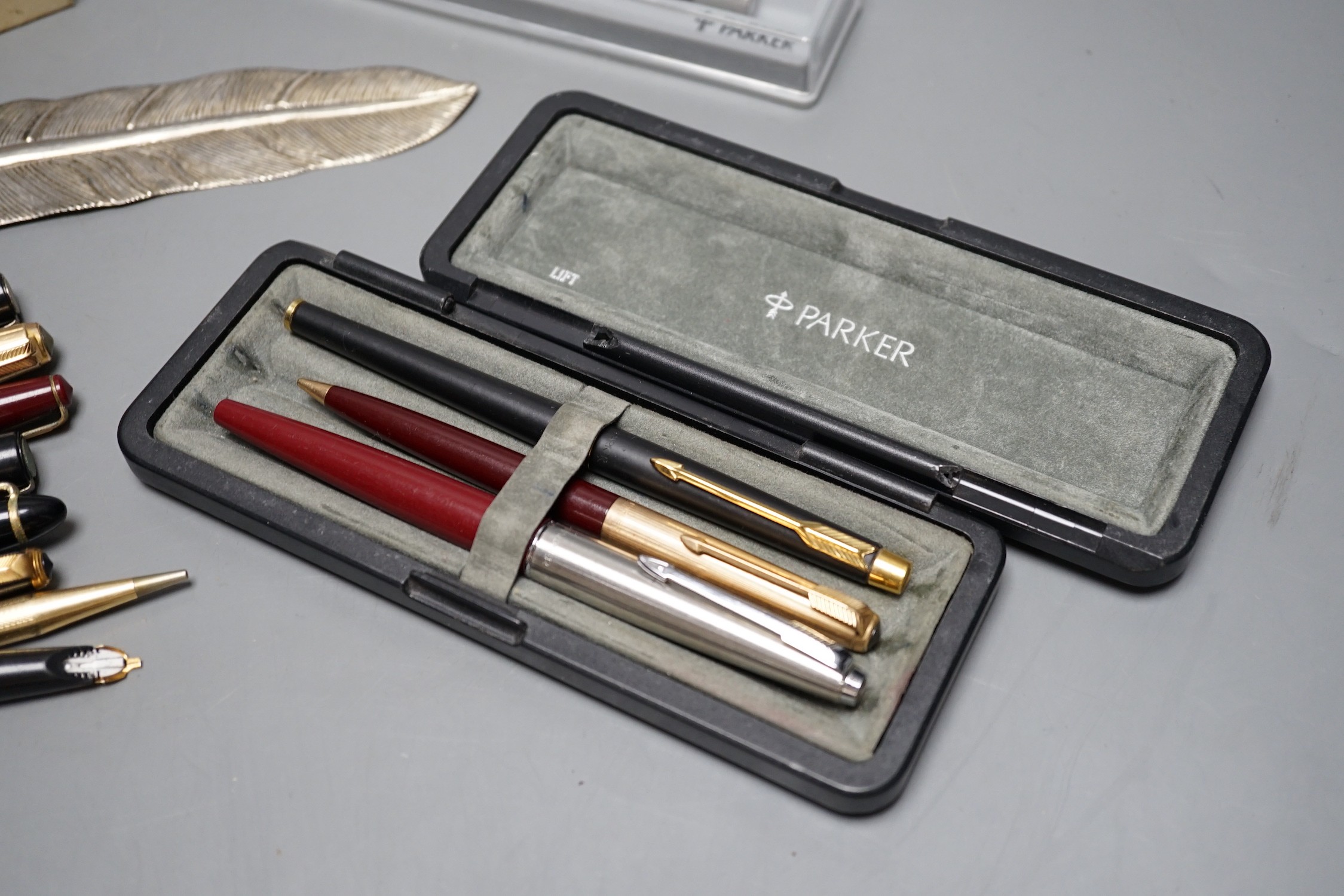 A collection of Conway, Sheaffer, Parker pens and others